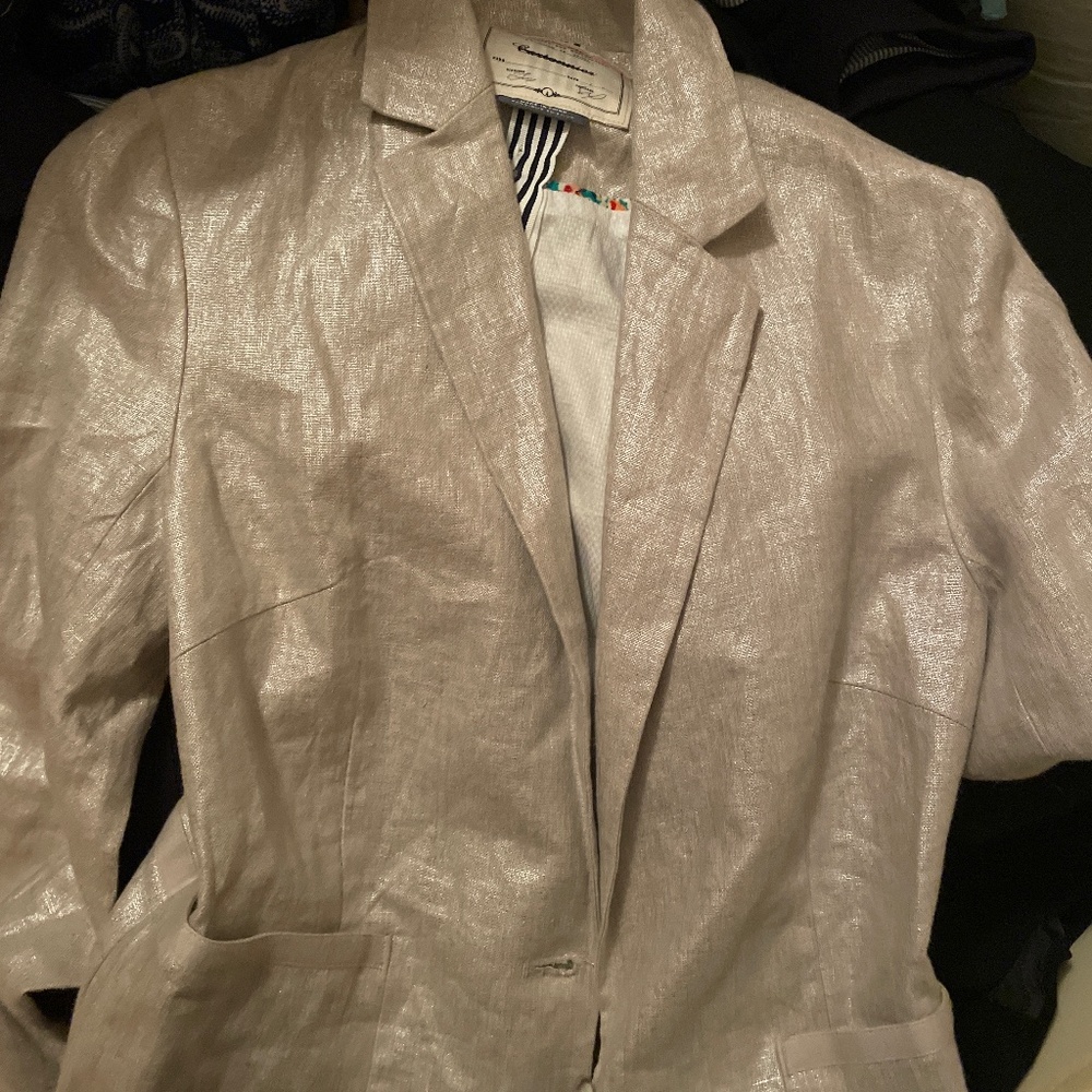 Woman’s gold blazer